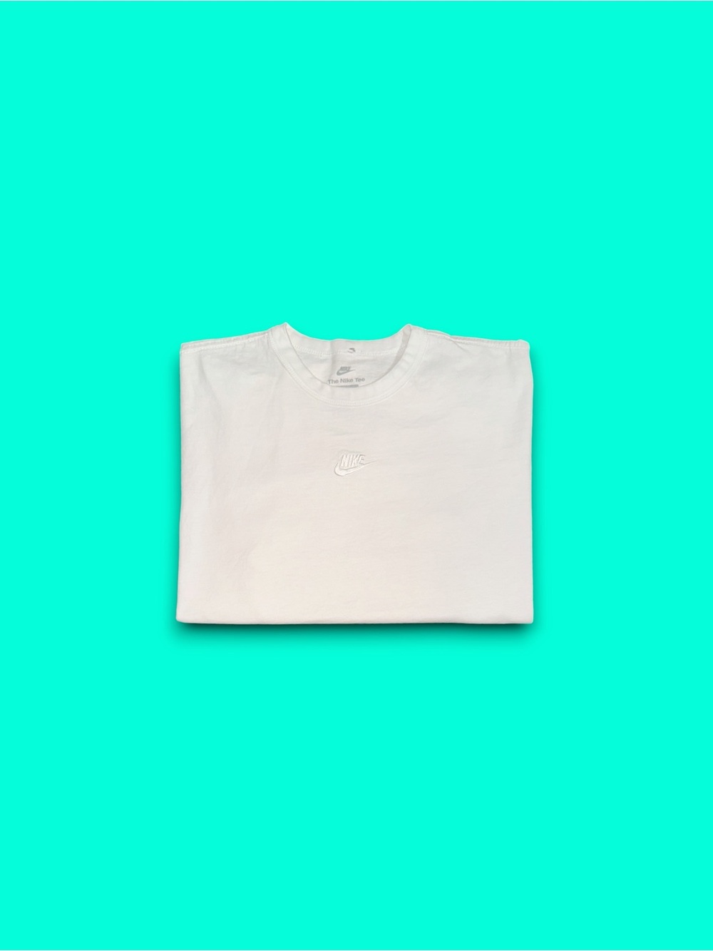 The Nike tee embroidered center swoosh loose fit t-shirt white mens large